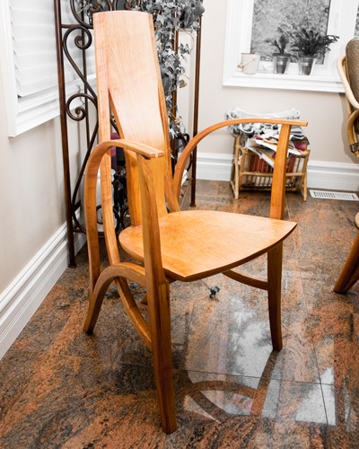 Armchair, Steam-bent arms and legs, tall curved back, shaped seat