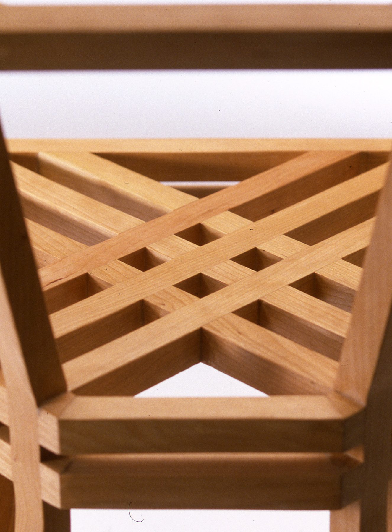 Lattice seat detail, Crossed slats let into a solid frame