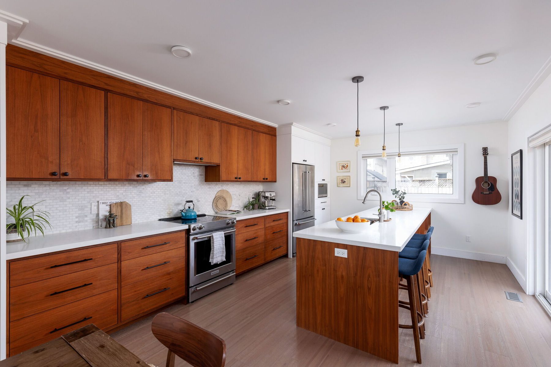 Kitchen, Walnut wall cabinets to the ceiling and deep drawer base run