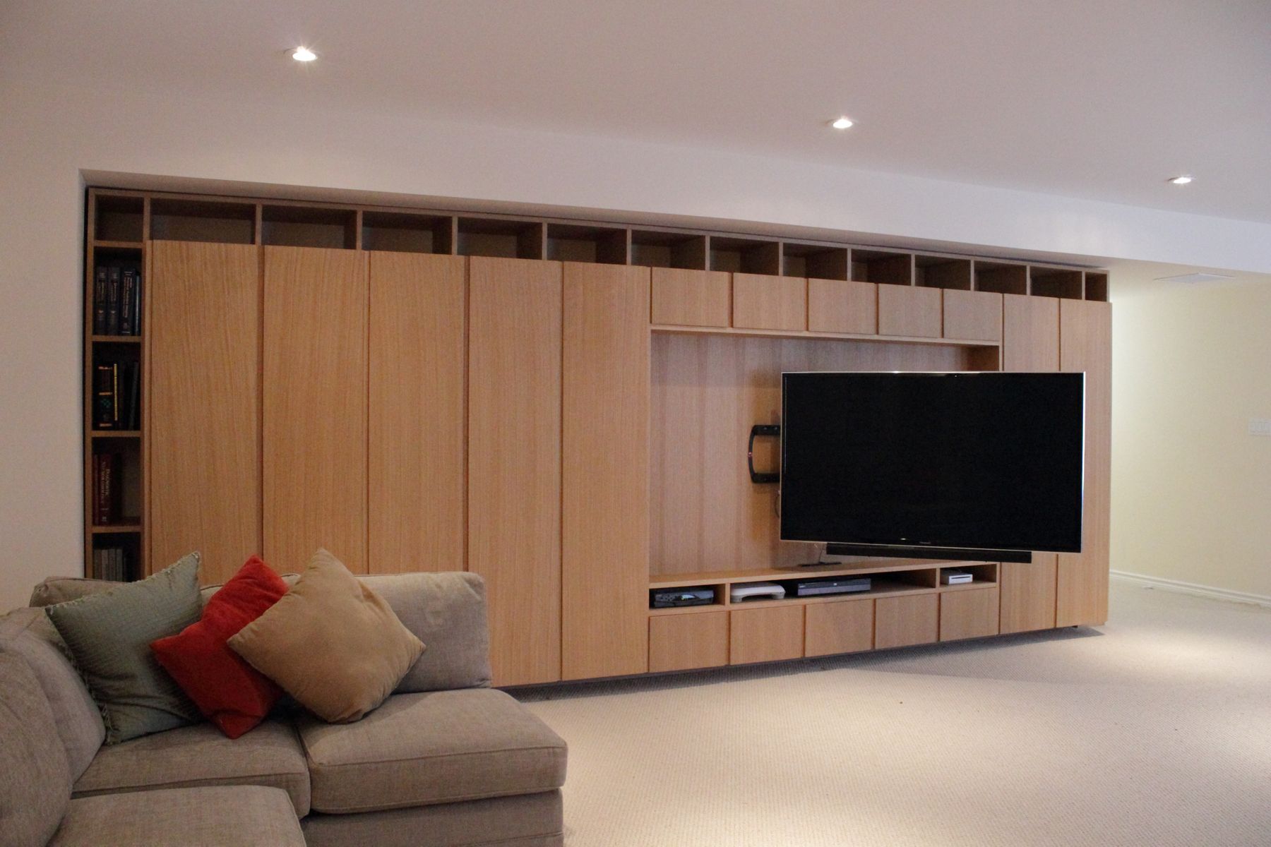 Basement wall, TV recess with media drawers
